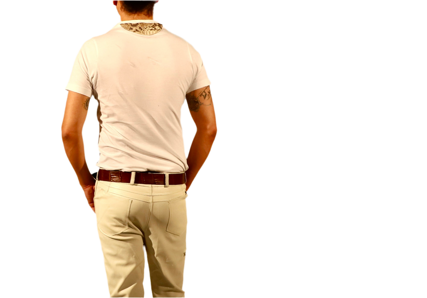 Man wearing The Python Tee with stylish back design, showcasing its elegance and comfort.